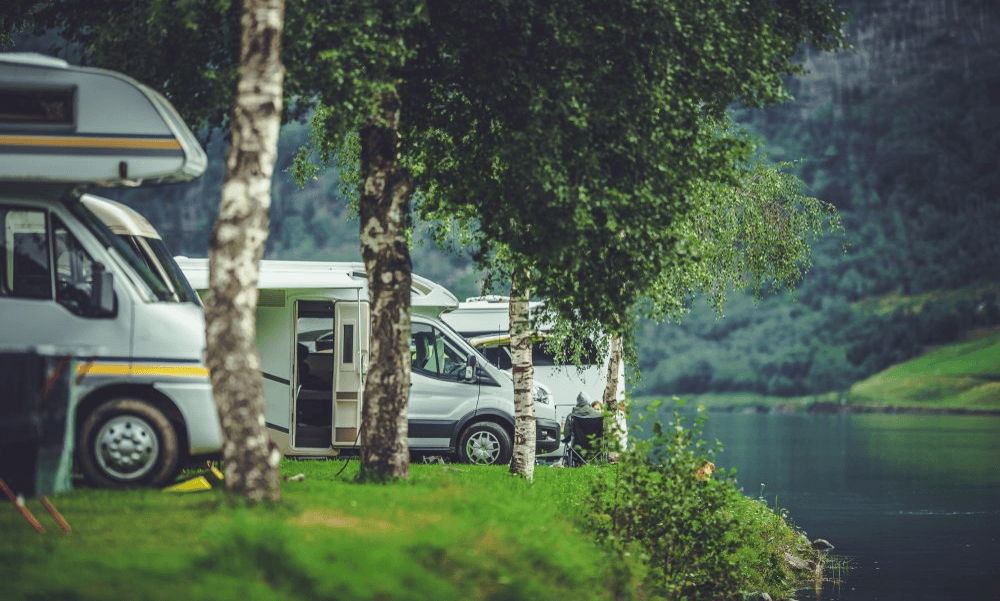 RVs parked along a lakefront