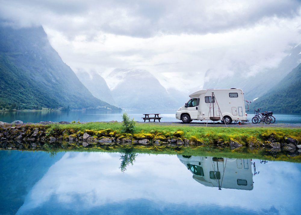 RV parked beside a lake